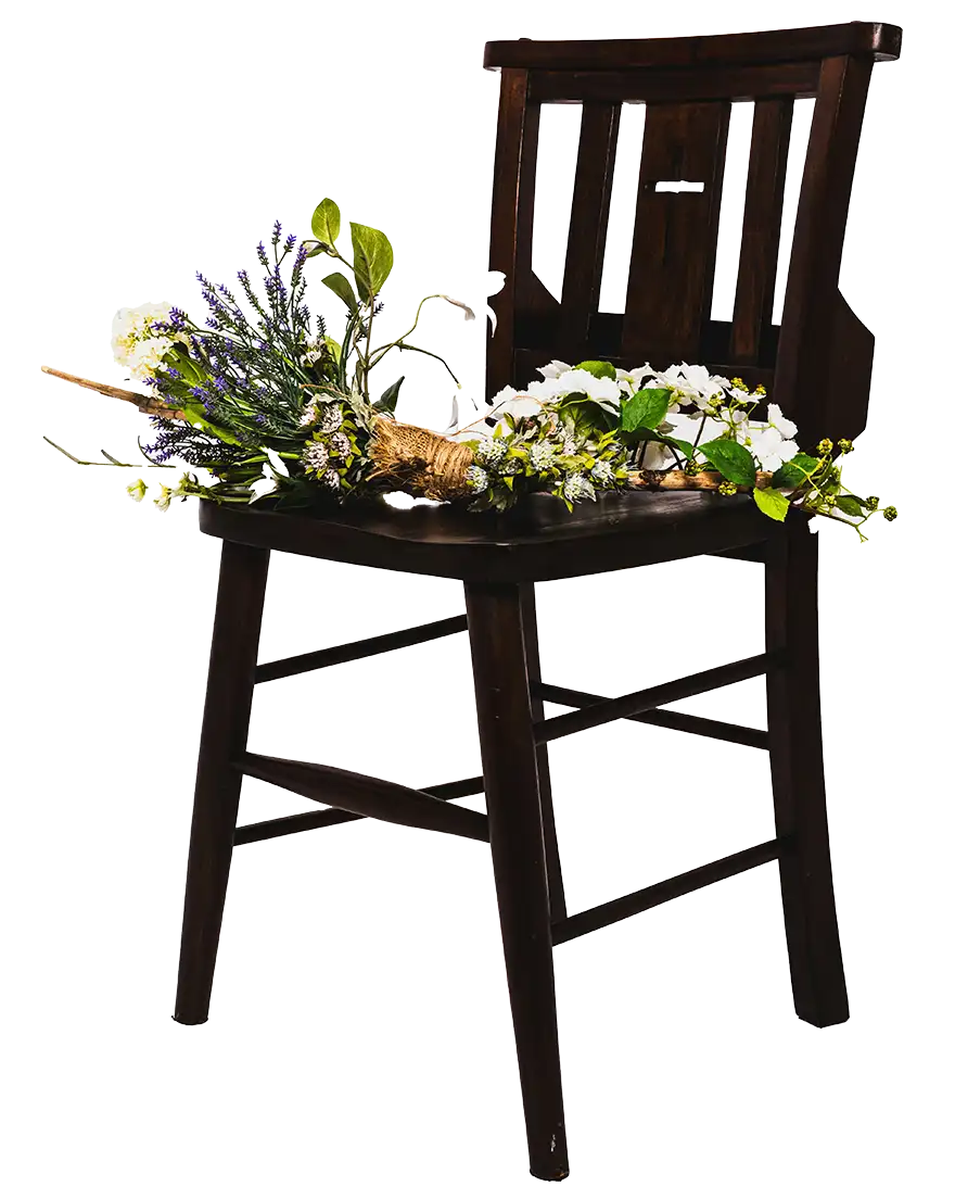 flowers on a wooden chair