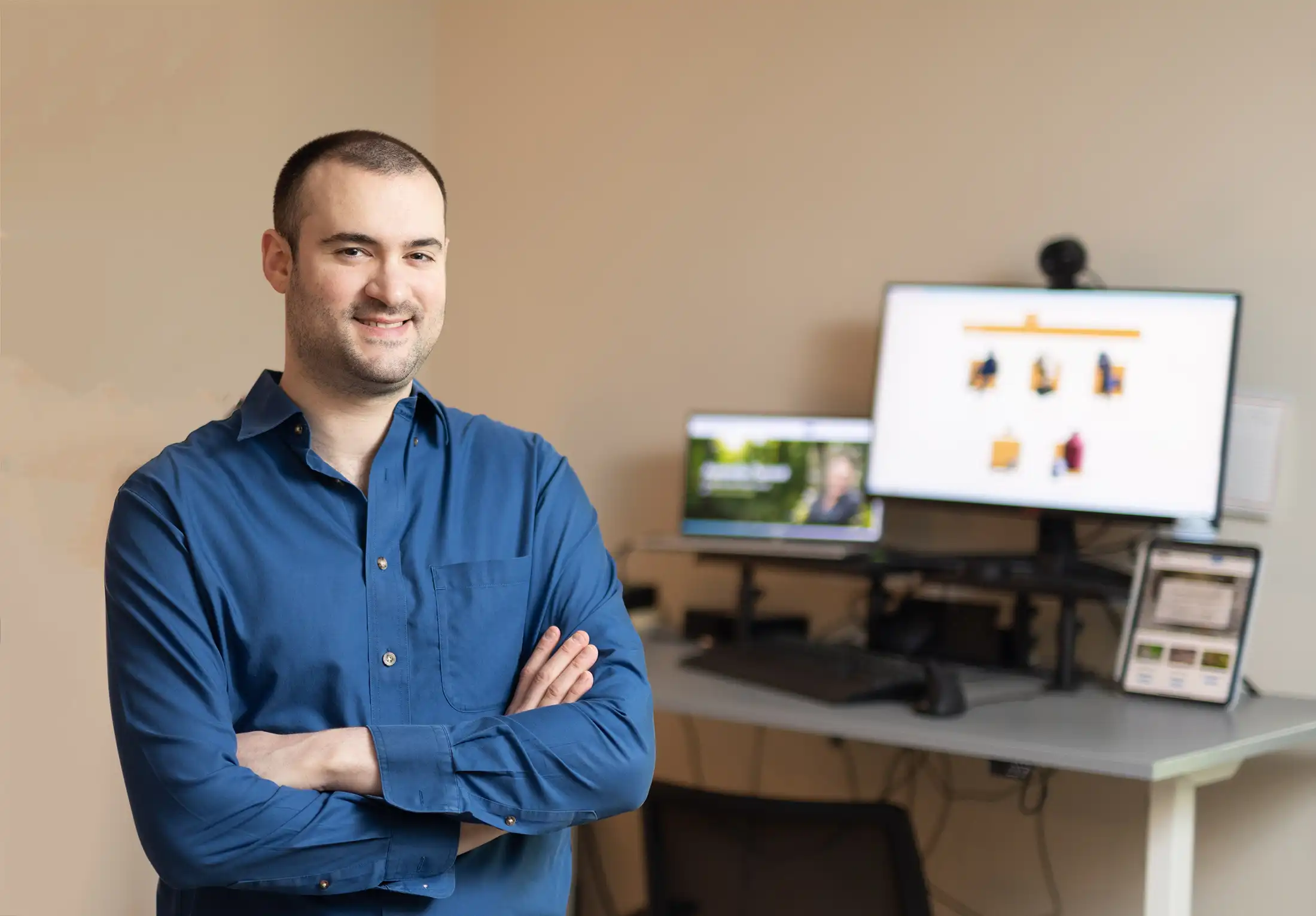 chad lewine at computer desk - web designer